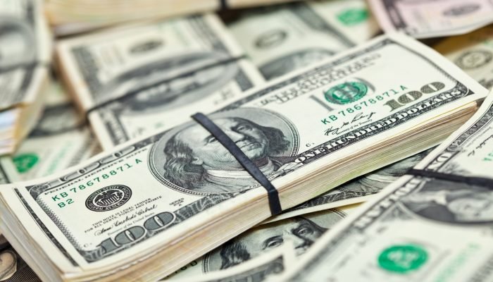 many-us-dollars-banknotes.jpg