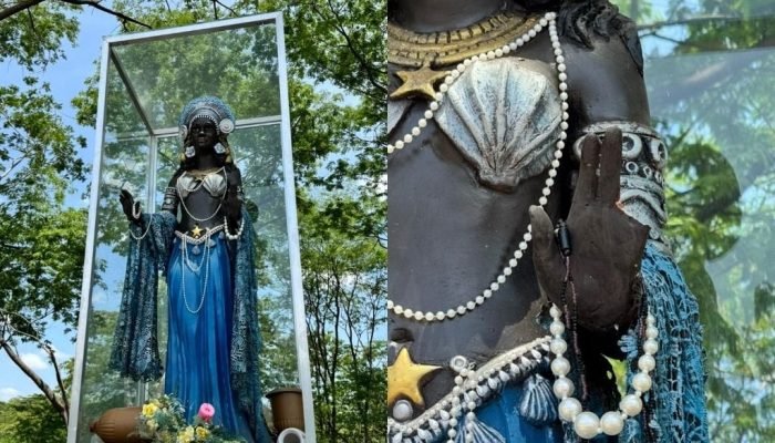 O aquário de vidro e uma parte da mão da estatua foi quebrado (Foto: Reprodução)